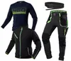 A flat lay of workwear clothing items including a long-sleeved shirt, a fleece jacket, pants, and a belt. Produktbild-Vorschau