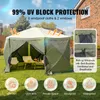A pop-up tent set up in a grassy backyard with chairs and a table inside. Anteprima dell’immagine prodotto