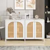 A white sideboard with cane doors is displayed in a room with artwork on the wall. Anteprima dell’immagine prodotto