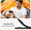 A man is sitting in a tent and looking at his phone. Produktbild-Vorschau