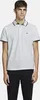 A man wearing a white polo shirt and black pants. Produktbild-Vorschau