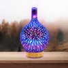 An aroma diffuser with a starburst pattern is placed on a wooden surface with a blurred background of trees. Voir les images du produit