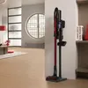 Lifestyle-Bild des roten Hitachi Akkusaugers PV-XH 4 PL AR in einem modern eingerichteten Wohnzimmer Produktbild-Vorschau