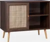 A dark wood sideboard with a rattan door and three open shelves, standing on four tapered legs. Anteprima dell’immagine prodotto