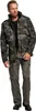 A man wearing camouflage pants and jacket, standing against a white background. Produktbild-Vorschau