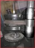 A close-up view of a mechanical component, likely part of a vehicle suspension system. Voir les images du produit