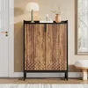 A shoe cabinet with two doors is shown in a room with a door and a window in the background. Produktbild-Vorschau