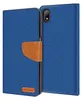 A blue flip case for a smartphone, with a brown accent. Produktbild-Vorschau