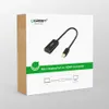 The image shows the retail packaging of a Ugreen Mini DisplayPort to HDMI converter. The packaging is mostly white with green and brown accents. The product itself is depicted on the front of the box. Voir les images du produit