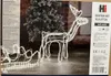 A product box for a reindeer and sleigh Christmas decoration with LED lights. Produktbild-Vorschau