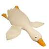 A plush toy goose lying on a white background. Náhled obrázku produktu
