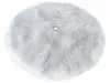 A round, white, fluffy rug is shown from a top-down perspective against a white background. Náhľad obrázku produktu