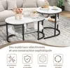 A set of nesting coffee tables with a marble-like design and black metal frames, displayed in a living room setting. Produktbild-Vorschau