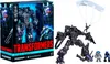 A Transformers Studio Series Leader Class Action Figure Shockwave toy is shown in its packaging and also displayed outside of the packaging with accessories. Produktbild-Vorschau