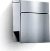 A modern, brushed stainless steel mailbox mounted on a white wall, casting a shadow. Anteprima dell’immagine prodotto