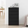 A black dresser with five drawers is shown in a room with a dining table and chairs visible in the background. Náhled obrázku produktu
