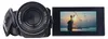 A camcorder with its screen displaying a person splashing water at sunset. Anteprima dell’immagine prodotto