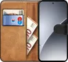 A book-style phone case with cards and cash inserted. Produktbild-Vorschau