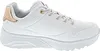 A side view of a single white sneaker with gold accents. Anteprima dell’immagine prodotto