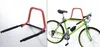 A bicycle wall mount is shown both by itself and with a bicycle attached. Produktbild-Vorschau