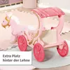 A pink toy horse-drawn carriage with gold decorative elements, placed on a light-colored rug. Produktbild-Vorschau