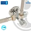 A close-up view of a chrome-plated brass double angle valve with two flexible hoses attached. Produktbild-Vorschau