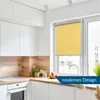 A modern kitchen with white cabinets, a wooden backsplash, and a yellow roller blind covering a window. Produktbild-Vorschau