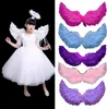 A young girl in an angel costume is shown on the left, with various colored angel wings displayed on the right. Produktbild-Vorschau