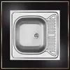 A stainless steel sink with a drainboard is shown from a top-down view, framed by a black background and gold border. Náhľad obrázku produktu