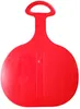 A red plastic sled with a handle, shown from a top-down perspective against a white background. Voir les images du produit