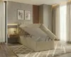 A bedroom with a bed that has its storage compartment open. Náhled obrázku produktu
