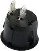 A close-up view of the back of a black, round toggle switch with two silver metal terminals. Produktbild-Vorschau
