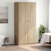 A corner wardrobe in a bedroom setting, next to a bed and a bench. Podgląd zdjęcia produktu