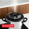 A close-up shot of a pressure cooker on a stovetop, with steam rising from the lid. Voir les images du produit