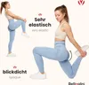 A woman is demonstrating the stretch and opacity of leggings in two poses. Produktbild-Vorschau