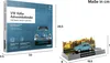 A product shot of a VW Beetle advent calendar and a separate display of a model VW Beetle with a backdrop. Anteprima dell’immagine prodotto