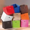 A stack of colorful storage boxes. Produktbild-Vorschau