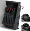 A close-up view of a black cast iron fireplace insert with a circular flue connector. Inset images show the flue connector from different angles, and red arrows indicate rotational movement. Produktbild-Vorschau
