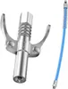 A close-up studio shot of a grease gun coupler and a flexible hose attachment against a white background. Produktbild-Vorschau