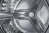 Close-up view of the inside of a washing machine drum. Produktbild-Vorschau