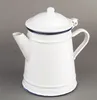 A white enamel kettle with blue trim against a gray background. Produktbild-Vorschau