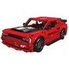 A red toy car model of a muscle car. Náhľad obrázku produktu