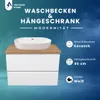 A marketing image for a bathroom vanity set, featuring a white ceramic sink on a wooden countertop above a white two-drawer cabinet. Text overlays describe the product features and brand. Produktbild-Vorschau