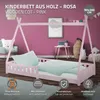 A pink wooden children's bed with a teepee frame, set up in a room with pink walls and a rug. Náhľad obrázku produktu
