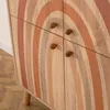A close-up view of a cabinet with a rainbow design and wooden knobs. Náhled obrázku produktu