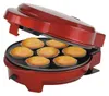 A red electric muffin maker with freshly baked muffins inside. Produktbild-Vorschau