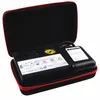 A tire repair kit with a compressor and sealant is displayed inside its open case. Produktbild-Vorschau