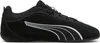A black Puma sneaker with white accents is shown against a white background. Produktbild-Vorschau