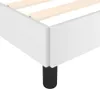 Close-up view of the corner of a white bed frame with black legs. Náhled obrázku produktu
