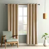 A living room scene with a window, curtains, a chair, and a plant. Anteprima dell’immagine prodotto